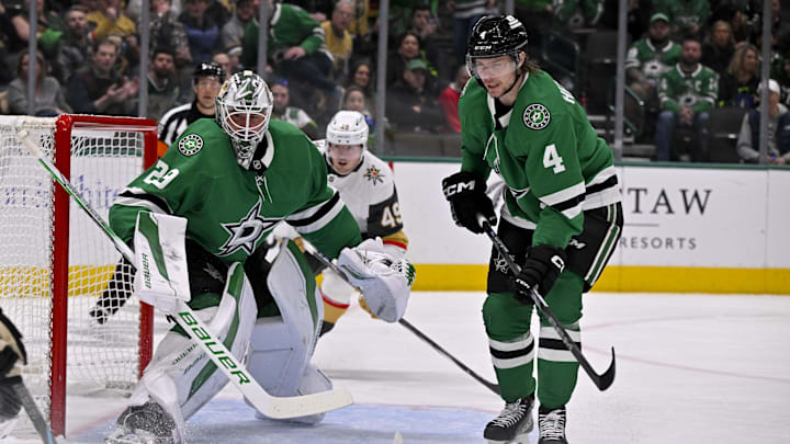 Jan 24, 2025; Dallas, Texas, USA; Dallas Stars goaltender Jake Oettinger (29) and defenseman Miro Heiskanen (4) in action during the game between the Dallas Stars and the Vegas Golden Knights at the American Airlines Center. Mandatory Credit: Jerome Miron-Imagn Images