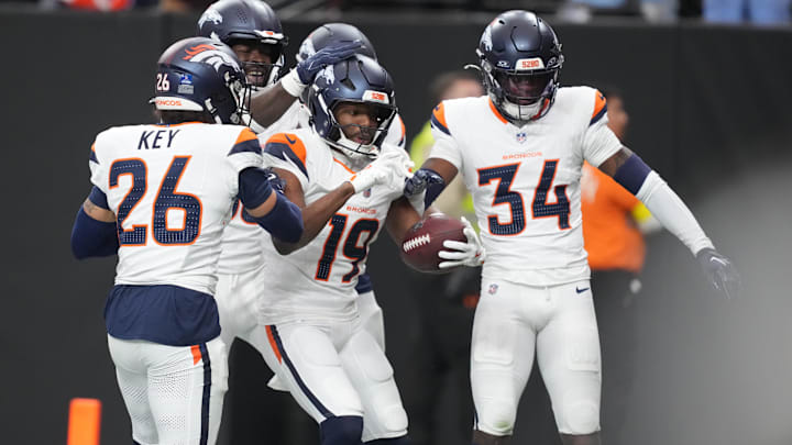 Dec 7, 2025; Paradise, Nevada, USA; Denver Broncos wide receiver Marvin Mims Jr. (19) reacts with teammates after returning a punt for a touchdown against the Las Vegas Raiders during the first half at Allegiant Stadium. Mandatory Credit: Kirby Lee-Imagn Images Dec 7, 2025; Paradise, Nevada, USA; Denver Broncos wide receiver Marvin Mims Jr. (19) reacts with teammates after returning a punt for a touchdown against the Las Vegas Raiders during the first half at Allegiant Stadium. Mandatory Credit: Kirby Lee-Imagn Images