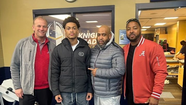 2026 cornerback Elbert Hill with Kalen DeBoer and Mo Linguist