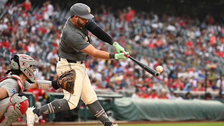 Sep 29, 2024; Washington, District of Columbia, USA; Washington Nationals first baseman Juan Yepez (18) hits the ball into play against the Philadelphia Phillies during the fifth inning at Nationals Park. Sep 29, 2024; Washington, District of Columbia, USA; Washington Nationals first baseman Juan Yepez (18) hits the ball into play against the Philadelphia Phillies during the fifth inning at Nationals Park.