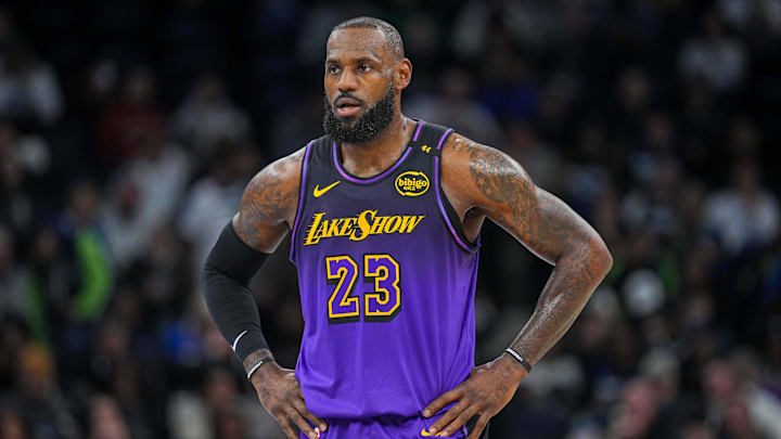 Dec 2, 2024; Minneapolis, Minnesota, USA; Los Angeles Lakers forward LeBron James (23) against the Minnesota Timberwolves in the first quarter at Target Center. Mandatory Credit: Brad Rempel-Imagn Images