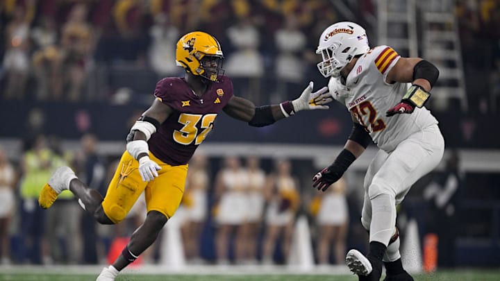 Dec 7, 2024; Arlington, TX, USA; Arizona State Sun Devils defensive lineman Prince Dorbah (32) and Iowa State Cyclones offensive lineman Jalen Travis (72) in action during the game between the Iowa State Cyclones and the Arizona State Sun Devils at AT&T Stadium. Mandatory Credit: Jerome Miron-Imagn Images