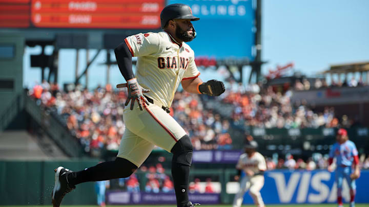 Sep 28, 2024; San Francisco, California, USA; San Francisco Giants outfielder Heliot Ramos (17) runs toward home to score a run on a fielding error by St. Louis Cardinals infielder Masyn Winn (0) (not pictured) during the first inning at Oracle Park. 