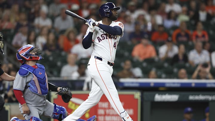 Apr 22, 2025; Houston, Texas, USA; Houston Astros designated hitter Yordan Alvarez (44) hits a single during the first inning against the Toronto Blue Jays at Daikin Park.