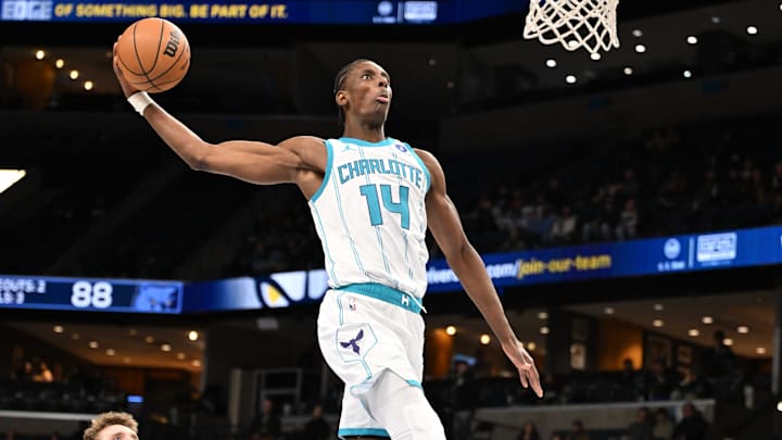 Jan 28, 2026; Memphis, Tennessee, USA; Charlotte Hornets forward Moussa Diabate (14) elevates to dunk the ball in the fourth quarter against the Memphis Grizzlies at FedExForum. Mandatory Credit: Matthew Smith-Imagn Images