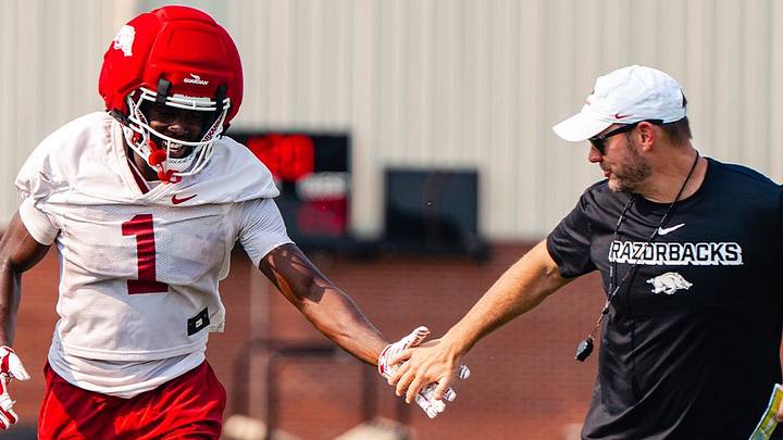 Arkansas coach Ryan Silverfield celebrates following a big play at practice. Arkansas coach Ryan Silverfield celebrates following a big play at practice.