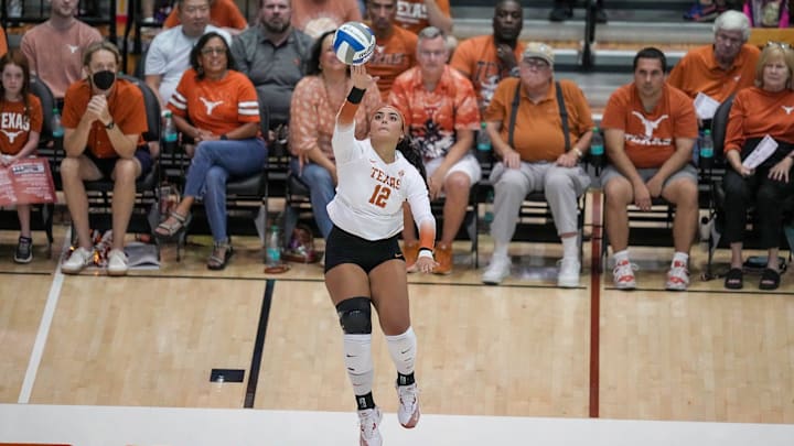 Texas Longhorns Keonilei Akana serves the ball against Hawaii Rainbow Wahine in the NCAA volleyball game at Gregory Gymnasium in Austin, on Friday, Sept. 20, 2024.