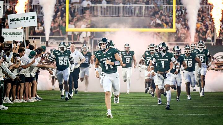 Michigan State’s Alessio Milivojevic, center, runs onto the field with the team before the game against Toledo on Friday, Sept. 4, 2026, at Spartan Stadium in East Lansing. Michigan State’s Alessio Milivojevic, center, runs onto the field with the team before the game against Toledo on Friday, Sept. 4, 2026, at Spartan Stadium in East Lansing.