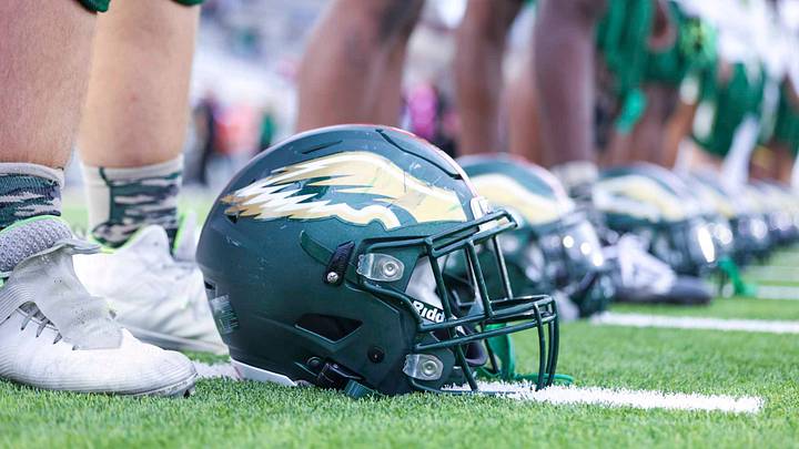 Cypress Falls Eagles helmets are lined up prior to a recent game.