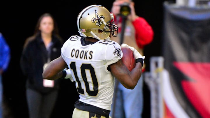 Dec 18, 2016; Glendale, AZ, USA; New Orleans Saints wide receiver Brandin Cooks (10) carries the ball after a catch for a touchdown in the first half against the Arizona Cardinals  at University of Phoenix Stadium. Mandatory Credit: Matt Kartozian-Imagn Images