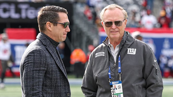 Nov 24, 2024; East Rutherford, New Jersey, USA; New York Giants owner John Mara, left, and New York Giants general manager Joe Schoen on the field before the game between the Giants and the Tampa Bay Buccaneers at MetLife Stadium.