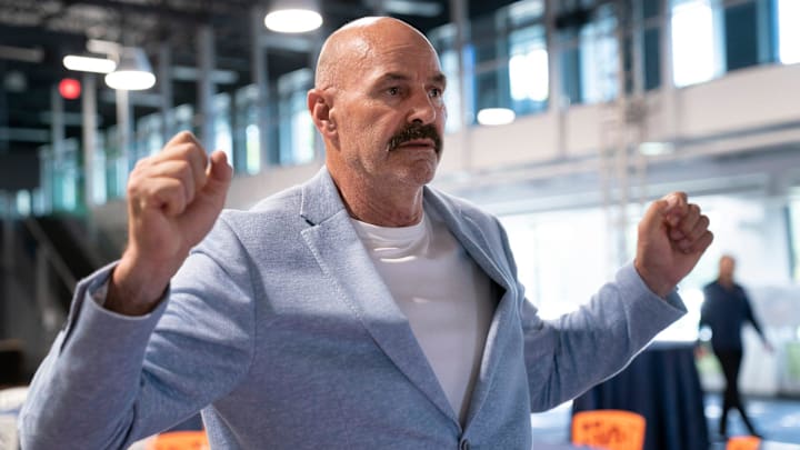 Kirk Gibson demonstrates his range of motion as he speaks about his plans to open the Kirk Gibson Center for Parkinson’s Wellness on Tuesday, Oct. 1, 2024 at their location in Farmington Hills. The center will be the first of its kind in Michigan and will provide free services for those living with Parkinson’s and their caregivers. GibsonÕs philosophy is “movement matters.”