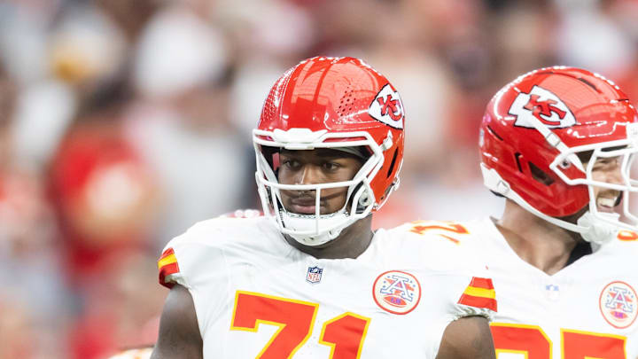 Aug 9, 2025; Glendale, Arizona, USA; Kansas City Chiefs offensive tackle Josh Simmons (71) against the Arizona Cardinals during a preseason NFL game at State Farm Stadium. Mandatory Credit: Mark J. Rebilas-Imagn Images
