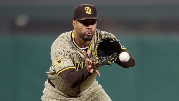 Sep 14, 2024; San Francisco, California, USA; San Diego Padres infielder Xander Bogaerts (2) fields a ground ball against the San Francisco Giants during the sixth inning at Oracle Park. Mandatory Credit: Robert Edwards-Imagn Images Sep 14, 2024; San Francisco, California, USA; San Diego Padres infielder Xander Bogaerts (2) fields a ground ball against the San Francisco Giants during the sixth inning at Oracle Park. Mandatory Credit: Robert Edwards-Imagn Images