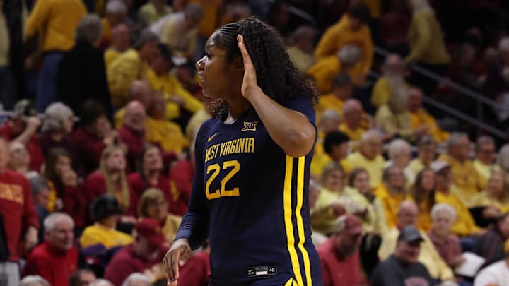Jan 11, 2026; Ames, Iowa, USA; West Virginia Mountaineers forward Kierra Wheeler (22) celebrates after they beat the Iowa State Cyclones during the second half at James H. Hilton Coliseum. Mandatory Credit: Reese Strickland-Imagn Images
