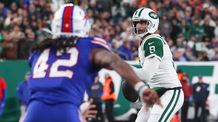Oct 14, 2024; East Rutherford, New Jersey, USA; New York Jets quarterback Aaron Rodgers (8) looks to pass the ball against the Buffalo Bills during the first half at MetLife Stadium