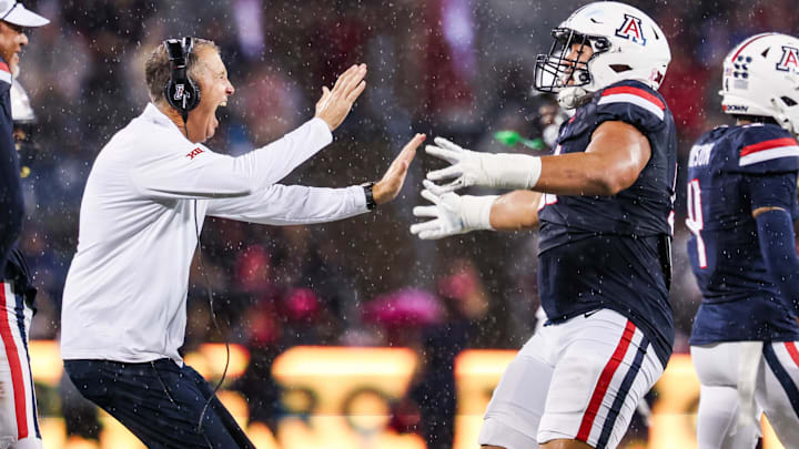 Oct 11, 2025; Tucson, Arizona, USA; Arizona Wildcats head coach Brent Brennan celebrates a blocked field goal during the second quarter of the game against the Brigham Young Cougars at Arizona Stadium. Mandatory Credit: Aryanna Frank-Imagn Images Oct 11, 2025; Tucson, Arizona, USA; Arizona Wildcats head coach Brent Brennan celebrates a blocked field goal during the second quarter of the game against the Brigham Young Cougars at Arizona Stadium. Mandatory Credit: Aryanna Frank-Imagn Images