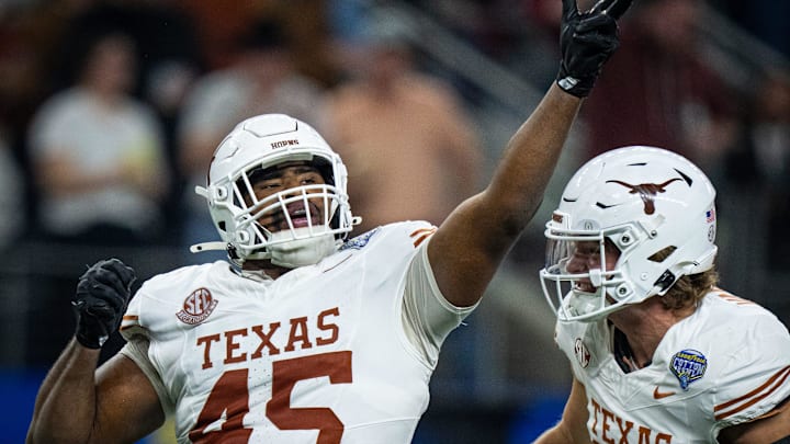 Texas Longhorns defensive lineman Vernon Broughton (45) celebrates a quarterback sack in the third quarter as the Texas Longhorns play the Ohio State Buckeyes in the Cotton Bowl College Football Playoff semi-final at AT&T Stadium in Dallas, Texas, Jan. 10, 2025. Texas Longhorns defensive lineman Vernon Broughton (45) celebrates a quarterback sack in the third quarter as the Texas Longhorns play the Ohio State Buckeyes in the Cotton Bowl College Football Playoff semi-final at AT&T Stadium in Dallas, Texas, Jan. 10, 2025.