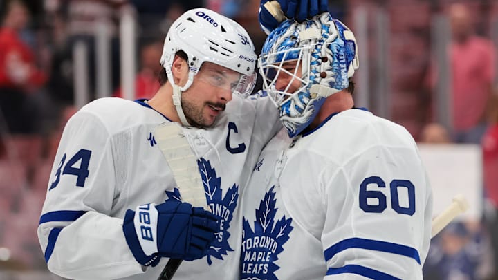 Dec 2, 2025; Sunrise, Florida, USA; Toronto Maple Leafs center Auston Matthews (34) celebrates with goaltender Joseph Woll (60) after the game against the Florida Panthers at Amerant Bank Arena. Mandatory Credit: Sam Navarro-Imagn Images