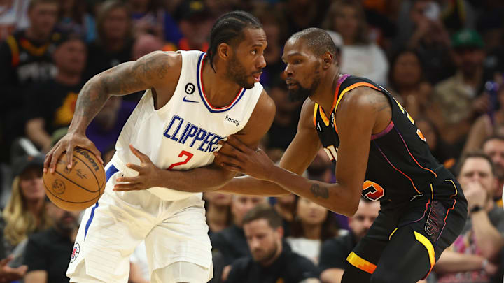 Los Angeles Clippers forward Kawhi Leonard (2) controls the ball against Phoenix Suns forward Kevin Durant (35) in the second half during game two of the 2023 NBA playoffs at Footprint Center. Mandatory Credit: Mark J. Rebilas-Imagn Images Los Angeles Clippers forward Kawhi Leonard (2) controls the ball against Phoenix Suns forward Kevin Durant (35) in the second half during game two of the 2023 NBA playoffs at Footprint Center. Mandatory Credit: Mark J. Rebilas-Imagn Images
