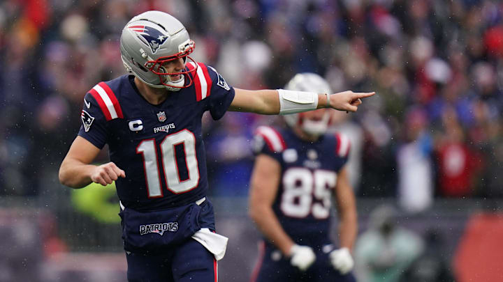Dec 14, 2025; Foxborough, Massachusetts, USA; New England Patriots quarterback Drake Maye (10) reacts after a touchdown against the Buffalo Bills in the first half at Gillette Stadium. Mandatory Credit: David Butler II-Imagn Images