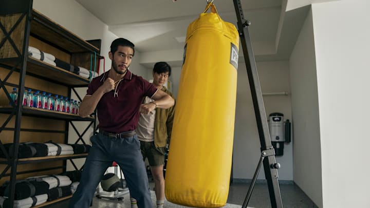 The Brothers Sun. (L to R) Justin Chien as Charles Sun, Sam Song Li as Bruce Sun in episode 106 of The Brothers Sun. Cr. Michael Desmond/Netflix © 2023