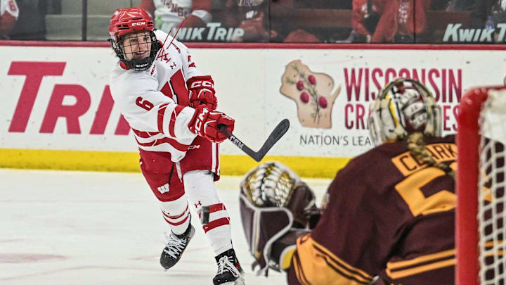 Wisconsin Badgers right wing Lacey Eden (6) shoots against the Minnesota Gophers in a game Sunday, February 9, 2025, at LaBahn Arena in Madison, Wisconsin.