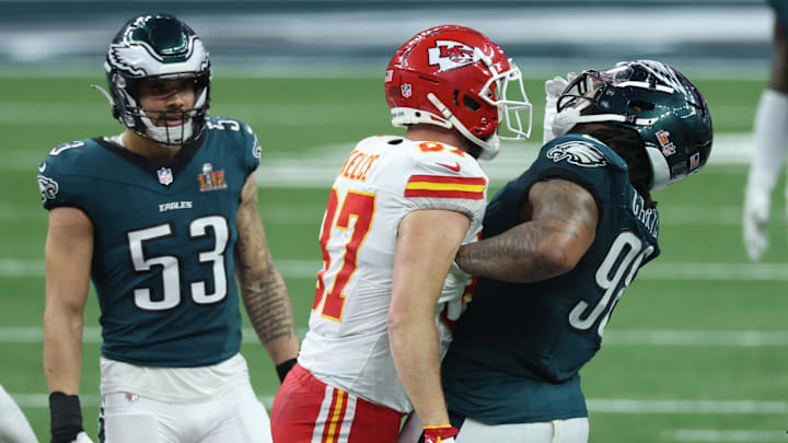 Feb 9, 2025; New Orleans, LA, USA; Kansas City Chiefs tight end Travis Kelce (87) bumps into Philadelphia Eagles defensive tackle Jalen Carter (98) in the fourth quarter  in Super Bowl LIX at Ceasars Superdome. Mandatory Credit: Stephen Lew-Imagn Images