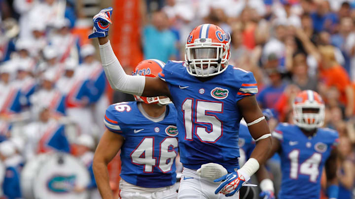 Nov 30, 2013; Gainesville, FL, USA; Florida Gators defensive back Loucheiz Purifoy (15) gets the crowd pumped up during the second quarter against the Florida State Seminoles at Ben Hill Griffin Stadium. Mandatory Credit: Kim Klement-Imagn Images