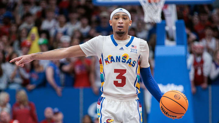Feb 10, 2024; Lawrence, Kansas, USA; Kansas Jayhawks guard Dajuan Harris Jr. (3) sets the play for the offense against the Baylor Bears