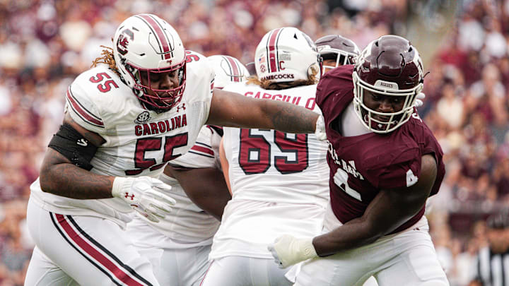 Oct 28, 2023; College Station, Texas, USA; South Carolina Gamecocks offensive lineman Jakai Moore (55) blocks Texas A&M Aggies defensive lineman Shemar Stewart (4) during the second quarter at Kyle Field. Mandatory Credit: Dustin Safranek-Imagn Images Oct 28, 2023; College Station, Texas, USA; South Carolina Gamecocks offensive lineman Jakai Moore (55) blocks Texas A&M Aggies defensive lineman Shemar Stewart (4) during the second quarter at Kyle Field. Mandatory Credit: Dustin Safranek-Imagn Images