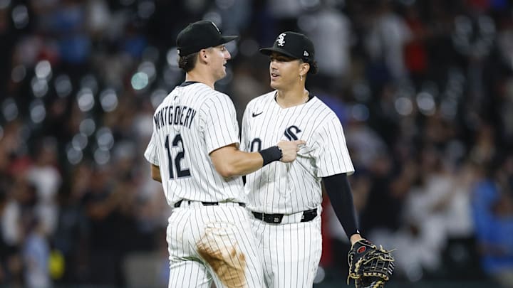 Jul 28, 2025; Chicago, Illinois, USA; Chicago White Sox third baseman Colson Montgomery (12) celebrates with first baseman Miguel Vargas (20) team's win against the Philadelphia Phillies at Rate Field. Mandatory Credit: Kamil Krzaczynski-Imagn Images