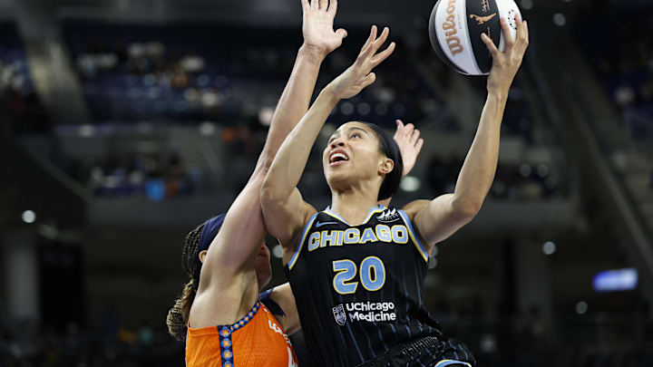 Jun 12, 2024; Chicago, Illinois, USA; Chicago Sky forward Isabelle Harrison (20) goes to the basket against the Connecticut Sun during the second half of a basketball game at Wintrust Arena. Mandatory Credit: Kamil Krzaczynski-Imagn Images