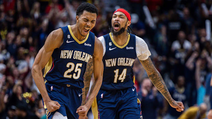 New Orleans Pelicans guard Trey Murphy III (25) reacts to making a three point basket with forward Brandon Ingram (14) against the Memphis Grizzlies during the second half at Smoothie King Center. Mandatory Credit: Stephen Lew-Imagn Images