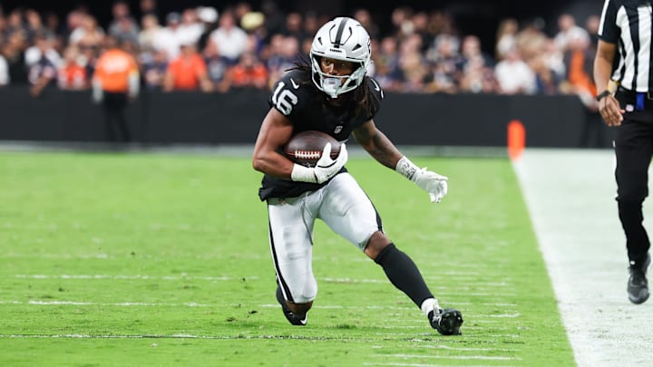 Sep 28, 2025; Paradise, Nevada, USA; Las Vegas Raiders wide receiver Jakobi Meyers (16) runs the ball during the second half against the Chicago Bears at Allegiant Stadium.