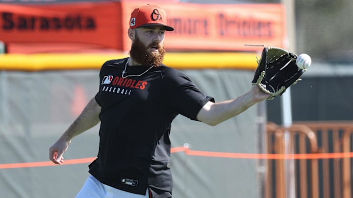 Feb 13, 2025; Sarasota, FL, USA;  Baltimore Orioles pitcher Colin Selby (60) works out during spring training workouts at Ed Smith Stadium. 