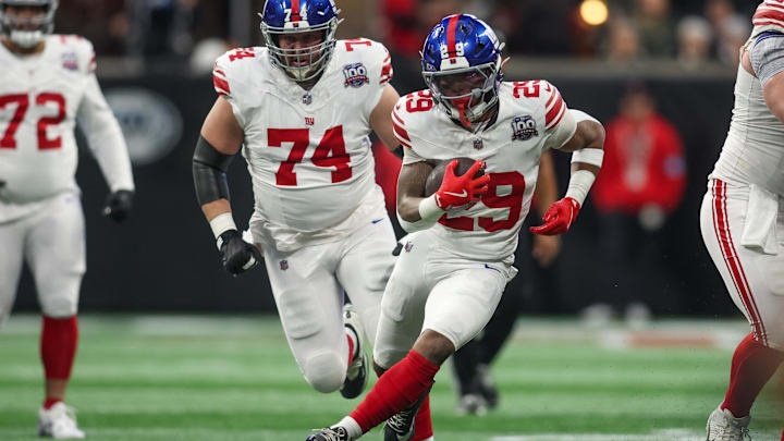 New York Giants running back Tyrone Tracy Jr. (29) runs the ball against the Atlanta Falcons New York Giants running back Tyrone Tracy Jr. (29) runs the ball against the Atlanta Falcons