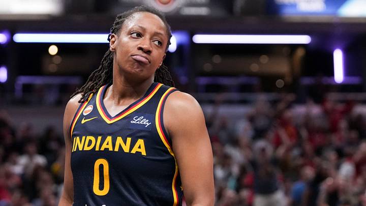 Indiana Fever guard Kelsey Mitchell (0) reacts after scoring Saturday, July 18, 2026, during the second half of a game at Gainbridge Fieldhouse in Indianapolis. The Indiana Fever defeated the New York Liberty, 108-88.