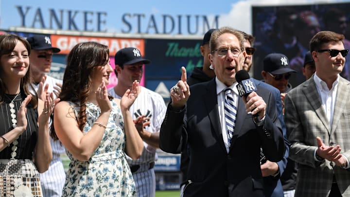 Apr 20, 2024; Bronx, New York, USA; Longtime Yankee announcer John Sterling is honored during a pregame ceremony in recognition of his retirement before a game against the Toronto Blue Jays at Yankee Stadium. Mandatory Credit: John Jones-Imagn Images