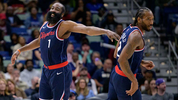 Mar 11, 2025; New Orleans, Louisiana, USA; Los Angeles Clippers forward Kawhi Leonard (2) and Los Angeles Clippers guard James Harden (1) react  during the second half against the New Orleans Pelicans at Smoothie King Center.