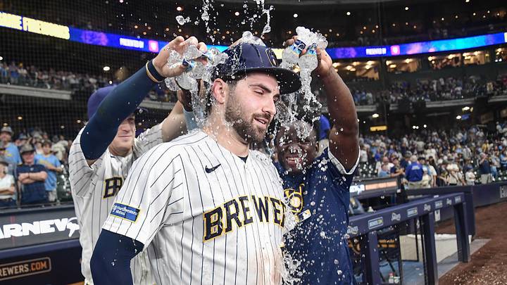 Sep 12, 2026; Milwaukee, Wisconsin, USA;  Milwaukee Brewers center fielder Garrett Mitchell (5) has water poured on him during a post game interview after beating the Cincinnati Reds at American Family Field.  Mandatory Credit: Benny Sieu-Imagn Images