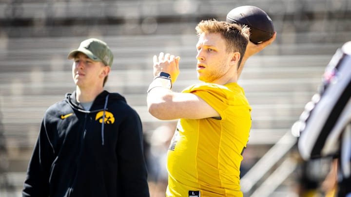 Apr 26, 2025; Iowa City, IA, USA; Iowa quarterback Mark Gronowski (11) throws during a spring NCAA football open practice at Kinnick Stadium. Mandatory Credit: Joseph Cress-The Des Moines Register