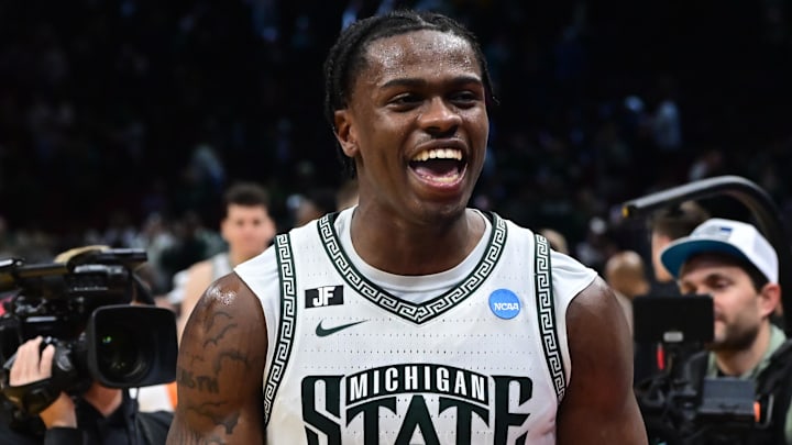 Mar 23, 2025; Cleveland, OH, USA; Michigan State Spartans forward Coen Carr (55) celebrates after the game against the New Mexico Lobos during the NCAA Tournament Second Round at Rocket Arena. Mandatory Credit: Ken Blaze-Imagn Images