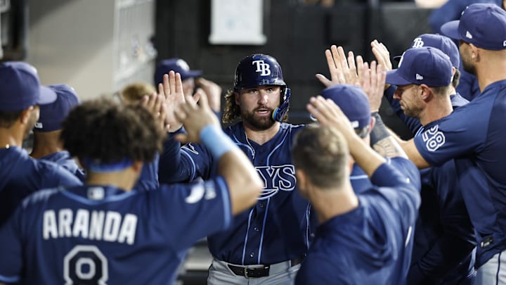 Apr 14, 2026; Chicago, Illinois, USA; Tampa Bay Rays right fielder Ryan Vilade (26) celebrates with teammates after scoring against the Chicago White Sox during the third inning at Rate Field. Mandatory Credit: Kamil Krzaczynski-Imagn Images