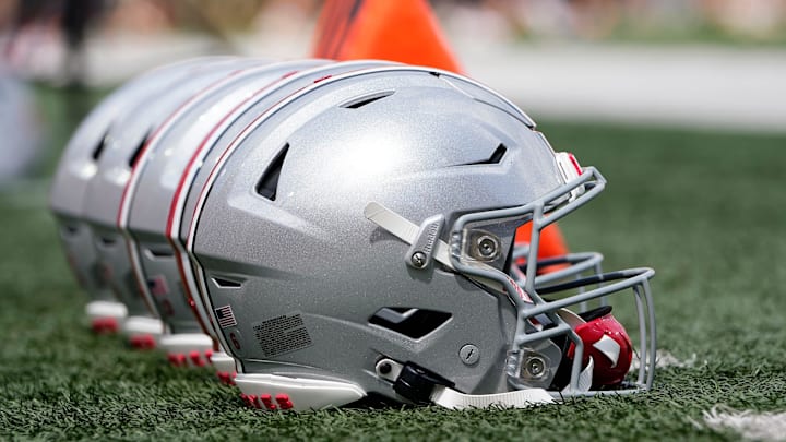 Sep 2, 2023; Bloomington, Indiana, USA; Ohio State Buckeyes helmets sit on the sideline prior to the NCAA football game at Indiana University Memorial Stadium. Ohio State won 23-3.