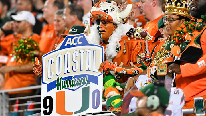 Nov 11, 2017; Miami Gardens, FL, USA; A Miami Hurricanes fan holds a sign in the closing minutes of the win over the Notre Dame Fighting Irish at Hard Rock Stadium. Mandatory Credit: Matt Cashore-Imagn Images