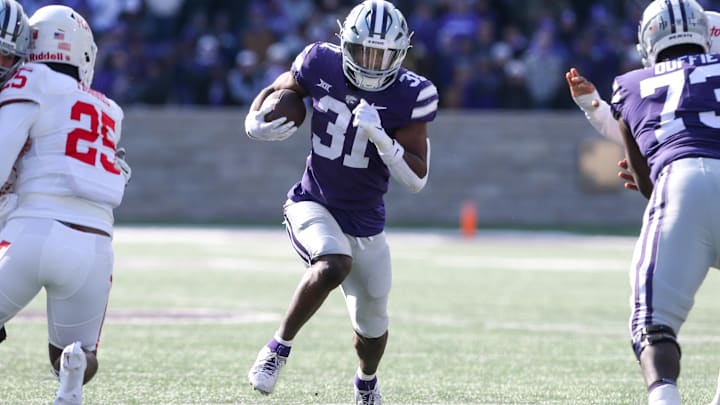 Oct 28, 2023; Manhattan, Kansas, USA; Kansas State Wildcats running back DJ Giddens (31) runs for the first down against Houston.