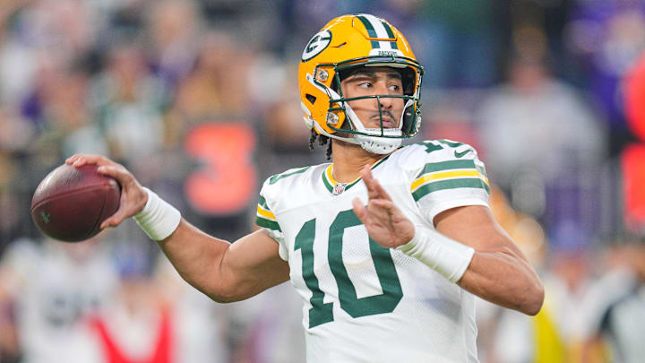 Dec 29, 2024; Minneapolis, Minnesota, USA; Green Bay Packers quarterback Jordan Love (10) passes against Minnesota Vikings in the first quarter at U.S. Bank Stadium. Mandatory Credit: Brad Rempel-Imagn Images