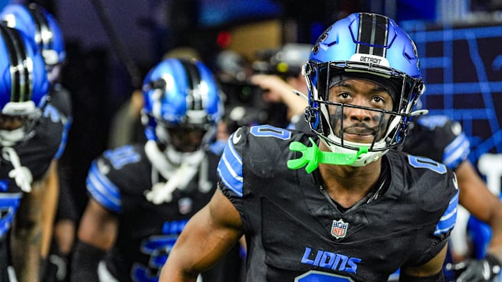 Detroit Lions cornerback Arnold runs onto the field for the Minnesota Vikings game at Ford Field in Detroit on Sunday, Jan. 5, 2025. 