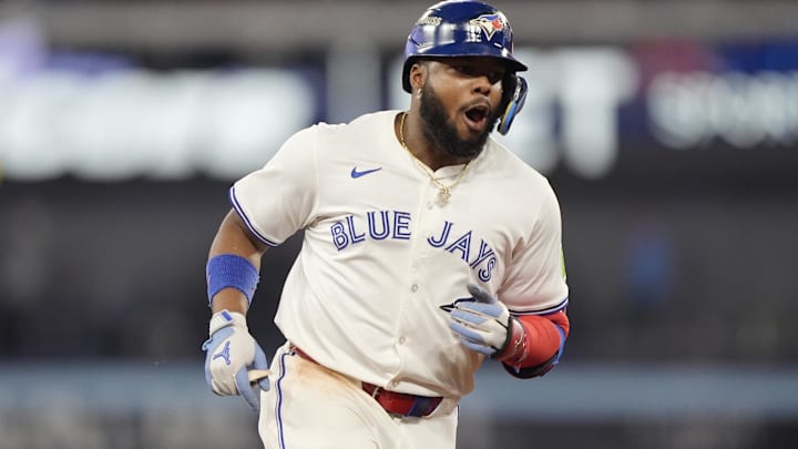 Oct 19, 2025; Toronto, Ontario, CAN; Toronto Blue Jays first baseman Vladimir Guerrero Jr. (27) runs after hitting a solo home run against the Seattle Mariners in the fifth inning during game six of the ALCS round for the 2025 MLB playoffs at Rogers Centre. 
